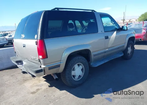 1999 Chevrolet Tahoe z USA, uszkodzony, nr VIN 3GNEK18R0XG101772